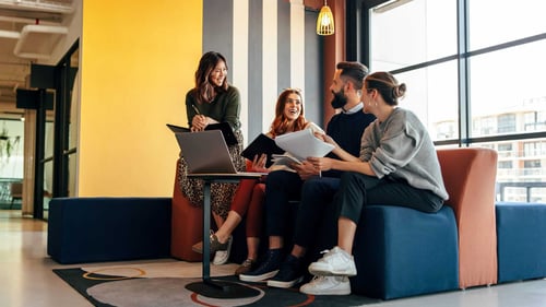 group of workers planning in an office group of workers planning in an office